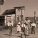 An old sepia picture of a rural family